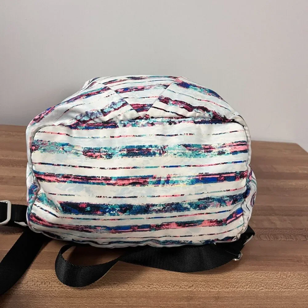 Ivivva by Lululemon Girl's Active Small Backpack Multi Stripe Bottom Shoe Pocket